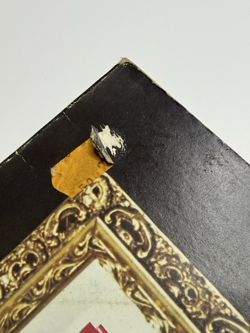 Sticker residue / writing, photo 1 of 2